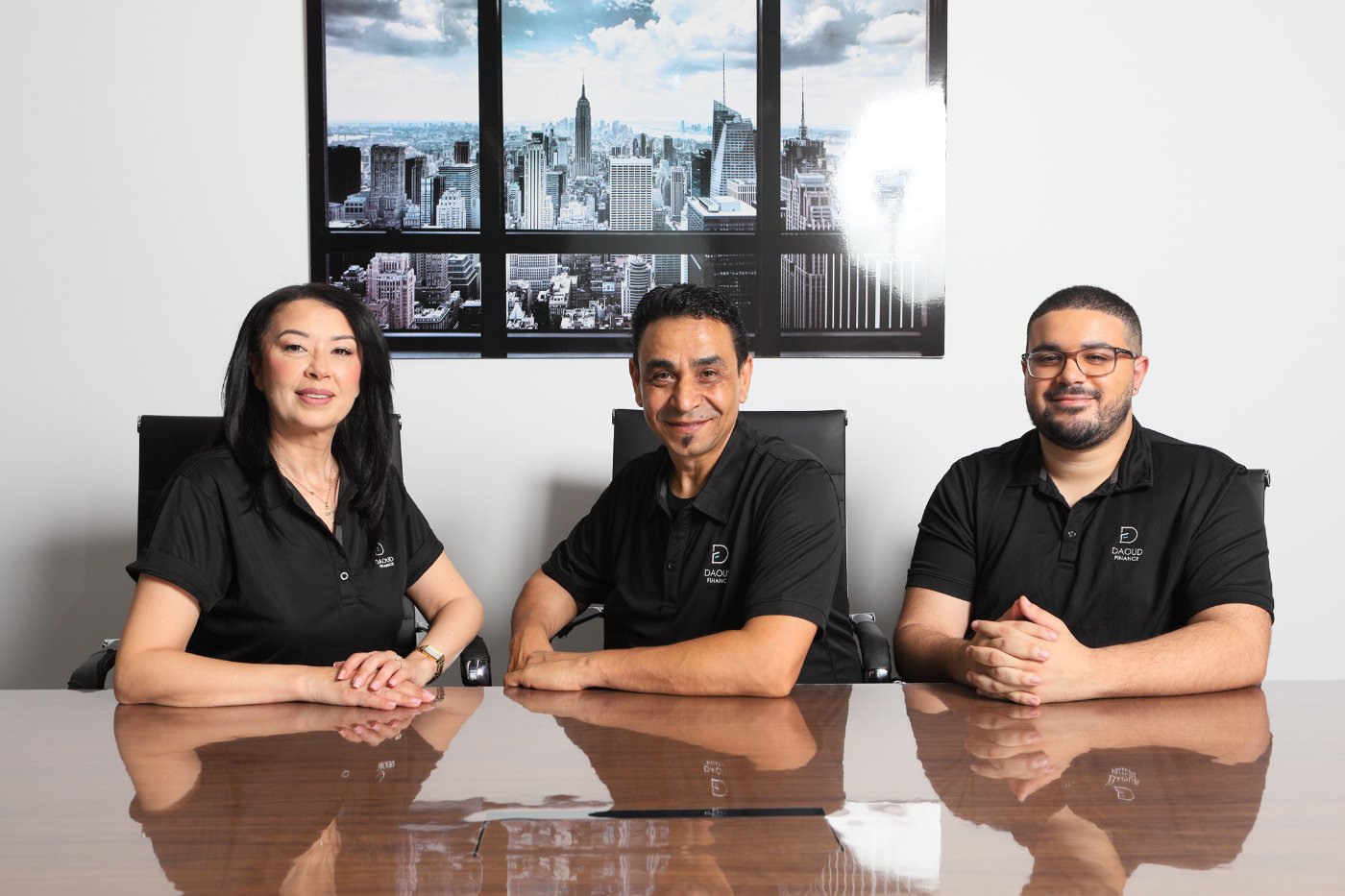The Daoud Finance team meeting together in the boardroom